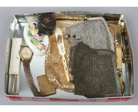 A group of vintage collectables including a carved bone letter opener with stanhope, cased inkwell, metal mesh clutch bags an