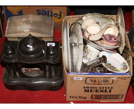 A box of miscellaneous ceramics and glass along with a slate mantle clock case and similar marble example.
