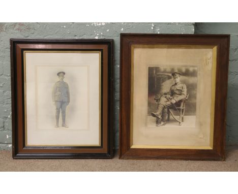 A framed World War I monochrome portrait photographs of soldiers.