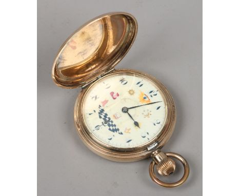 A Masonic full hunter pocket watch in gold plated Elgin case with enamel dial having subsidiary seconds and painted with Maso