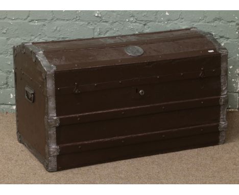 A dome top travel trunk in the theme of Harry Potter.