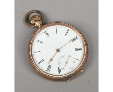 A 9ct gold pocket watch with white enamel dial and subsidiary seconds and Roman numeral markers.