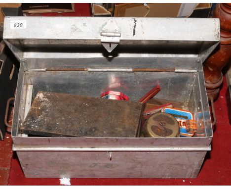 A galvanized steel tool box and contents to include old tins, parafin lamp, microscope parts lenses and accessories etc.