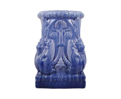 A 20th century Art Nouveau ceramic Majolica plant stand finished in blue, having lions / griffins to each corner, with square