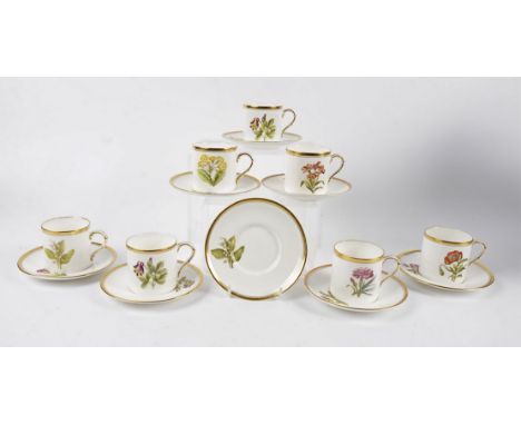 A Royal Worcester Botanical coffee set, comprising thirteen cups, fourteen saucers, transfer printed flowers, hand tinted wit