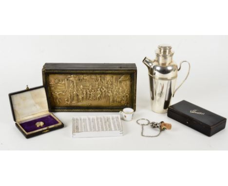 A silver plated cocktail shaker by W.S &amp; S,  together with a box with embossed decoration of revelry in the street, 29cm 