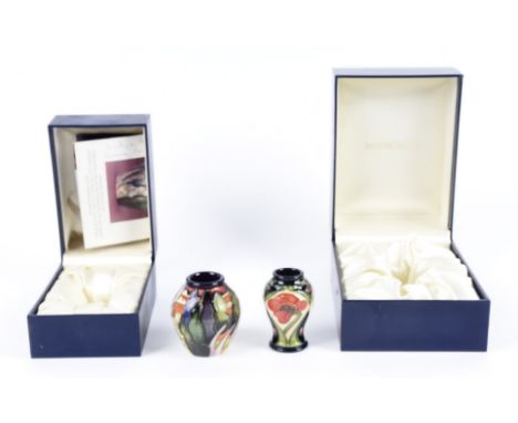 Two miniature Moorcroft vases, comprising an ovoid vase, Lodge Hill by Emma Bosson, 5.5cm high and a baluster example with st