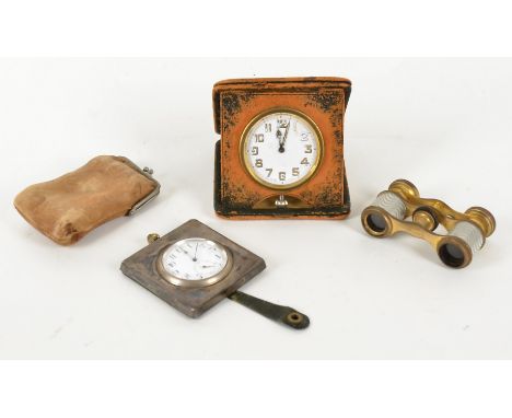 A pair of enamel and brass opera glasses, together with a leather purse and two travelling clocks, one with a subsidiary seco