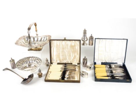 A quantity of silver and silver plate, including salt and pepper shakers, a ladle, fruit basket, bowl and two boxed six piece