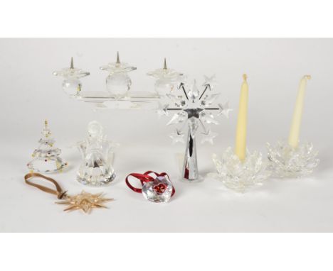A group of Christmas and Winter themed Swarovski crystal glass ornaments,   to include a Christmas tree, angel, stars and can