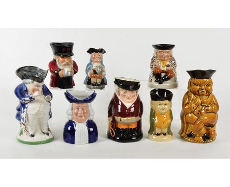 A collection of Toby jugs, including examples by Royal Doulton, including a 'Winston Churchill' and a limited edition 'Town C