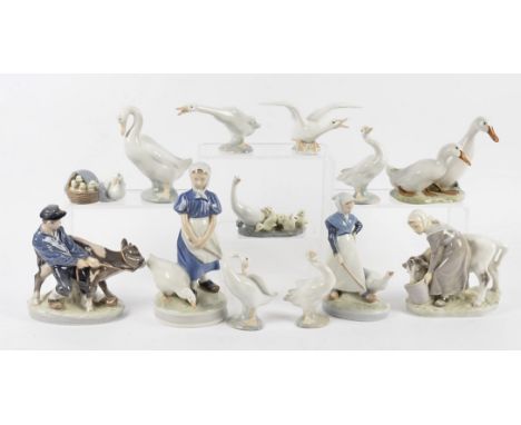 A collection of Royal Copenhagen rural figurines, modelled as young boys and girls with cattle and geese together with anothe