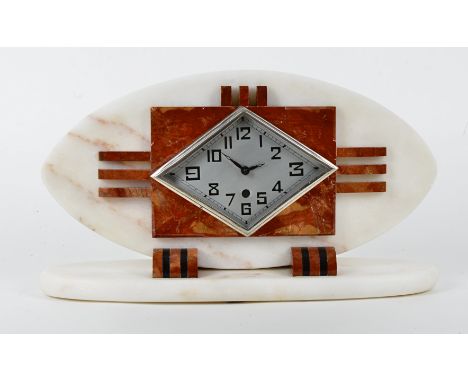 A French Art Deco mantel clock, in red and white marble, silvered face with Arabic numerals and a modern electric movement, w