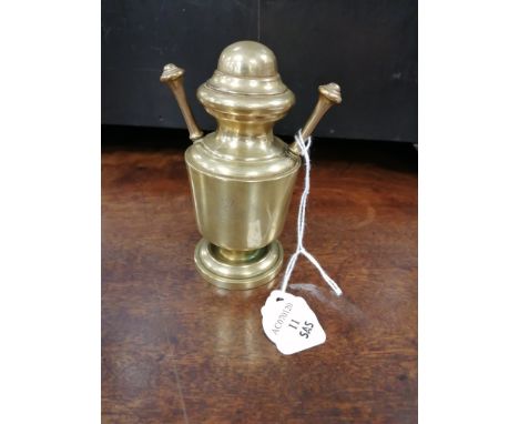 A French Gustave Keller brass table lighter,  the side etched with a lion and beneath it a banner stating the phrase 'Honesty