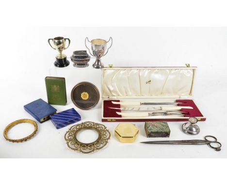 A set of Banda carpet bowls, in the original box, together with a Ronson lighter, a gold plated tape measure, wooden and meta