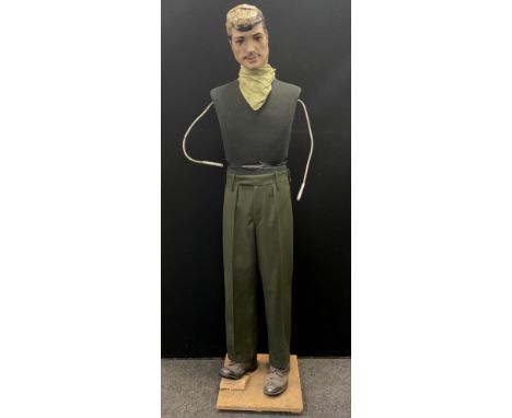 A 20th century shop mannequin, moulded head, brown hair, moustache, fabric two sectional body, articulated metal arms, approx