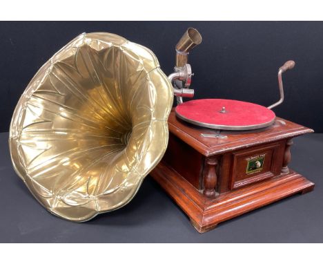 A hand-wound gramophone, “His Master’s Voice”, ‘The Gramophone Company Ltd’, square wooden case,  brass trumpet resonator (tr