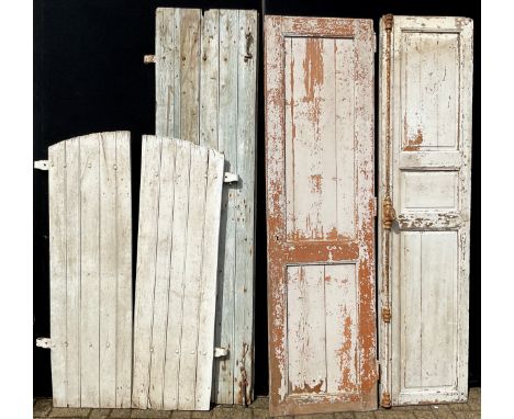 Architectural salvage - a group of French country house window shutters, windows, and doors, the largest measuring 197cm heig