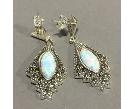 A pair of silver opal and marcasite earrings