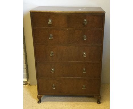 A 20th century walnut chest of drawers