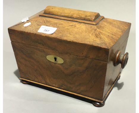 A sarcophagus form tea caddy, a backgammon set and a cribbage board