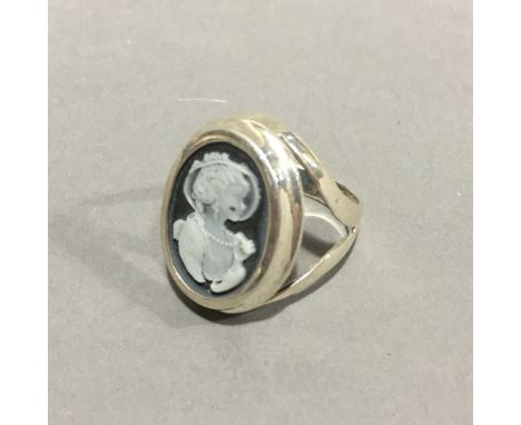 A silver cameo ring