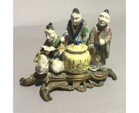 A Chinese pottery figural inkwell
