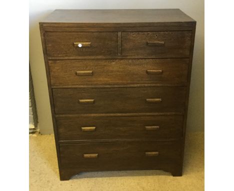An early 20th century oak chest of drawers