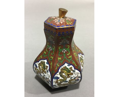 A Chinese cloisonne vase and cover decorated with dragons 