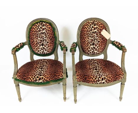 FAUTIEULS, a pair, each 60cm W x 92cm H, leopard print fabric with painted showframes. (2) 