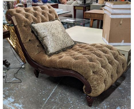 DAYBED, 83cm W x 106cm H x 177cm L, with a carved showframe buttoned upholstered. 
