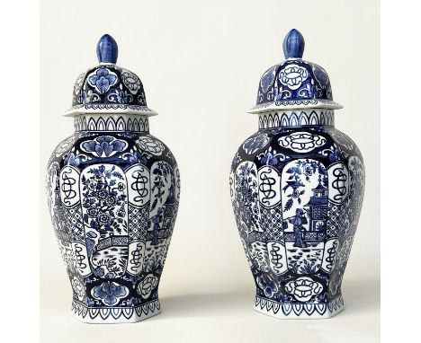 TEMPLE VASES, a pair, Chinese blue and white ceramic, hexagonal facetted with lids, 63cm H. (2) 