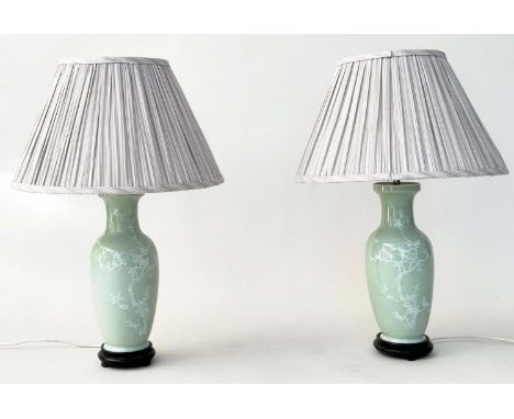 TABLE LAMPS, a pair, Celadon ceramic with foliate decoration of vase form with silk pleated shades, 58cm H. (2) 