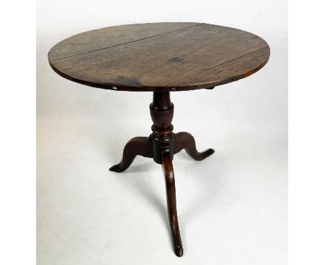 TRIPOD TABLE, George III c. 1780 country oak, circular tilt top on turned column with splayed tripod supports, 76cm D x 70cm 