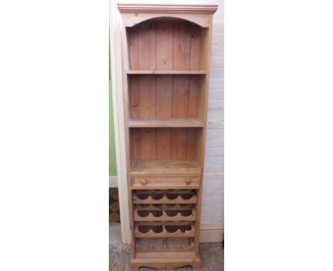 A Pine open shelf with wine rack