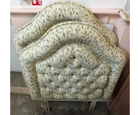 A pair of modern single, leaf design upholstered button back head boards