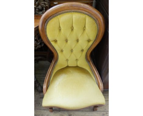 A Victorian Mahogany spoon back nursing chair with gold button back draylon upholstered
