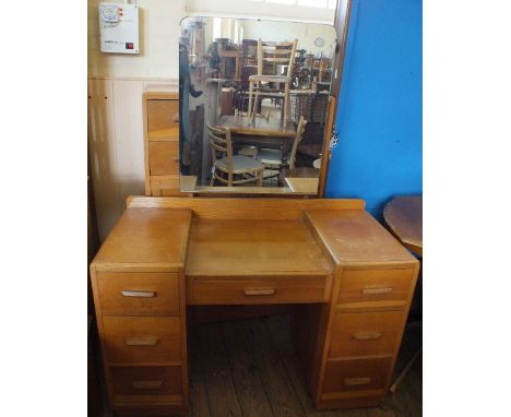 A light Oak dressing table and a two door tall boy