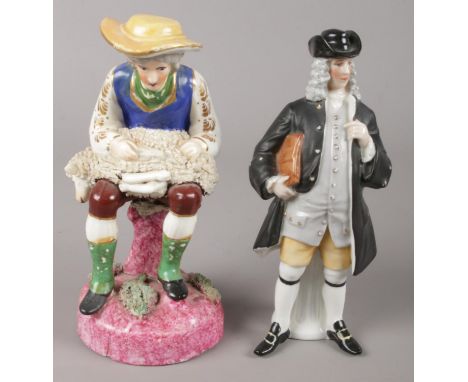Two continental ceramic figures, one depicting a man shearing a sheep.  