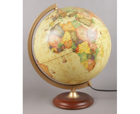 A modern Technodidattica light up globe, on turned wooden base.  