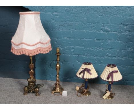 A collection of brass table lamps. Large brass table lamp &amp; shade, two brass bedside lamps &amp; a brass lamp base.  