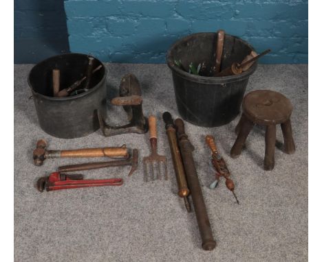 Two buckets of vintage tools. To include hand drill, hammers, small pick axe, and bicycle pumps etc.  
