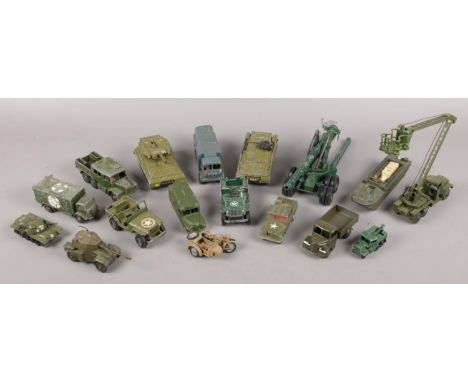 An assortment of Army Corgi and Dinky die-cast vehicles.  