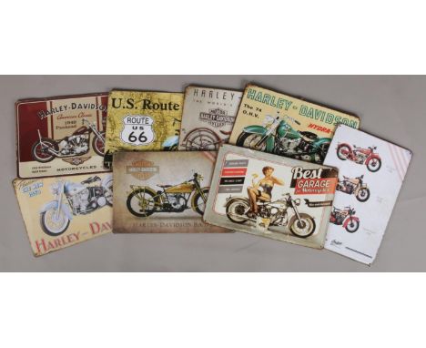 Eight reproduction metal signs advertising Harley-Davidson Motorcycles.  