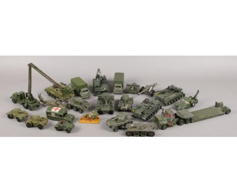 A large collection of Corgi and Dinky army vehicles. Includes tanks, jeeps and helicopter.  