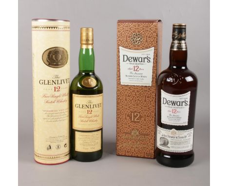 Two boxed bottles of unopened Scotch Whiskey. To include a bottle of Dewar's True Scotch aged 12 years &amp; a bottle of The 