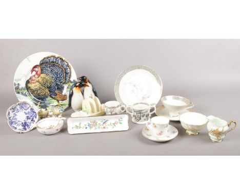 A small quantity of named ceramics. To include Aynsley penguins, Royal Worcester 'Marsh Tit' &amp; 'Blue Tit' &amp;  a Carlto