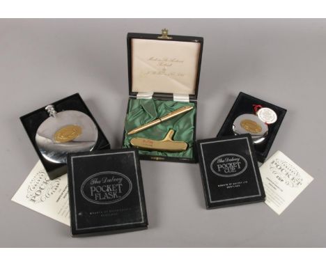 Three boxed collectable items. Includes Dalvey Pocket Flask, Dalvey Pocket Cup and a Halley golf themed Chromatic pen set.  