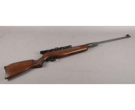 A Edgar Brothers MOD.60 .22cal break action air rifle with (4x20) scope. serial no 0402 04219. CAN'T POST THIS ITEM.  