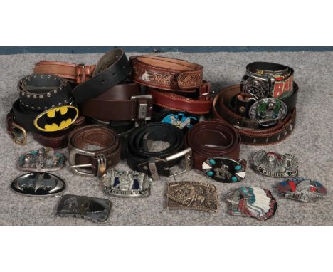 A collection of Belts and Belt Buckles. To include examples from Levi's, Harley Davidson and Batman.  